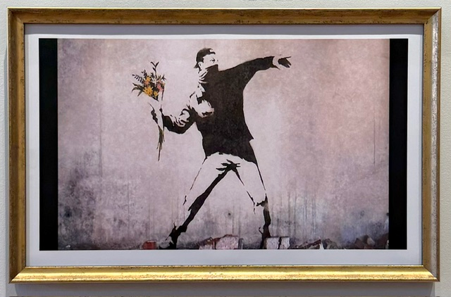 Love is in the Air by BANKSY